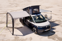Volkswagen California (2024) Ocean with erected tent and awning