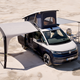 Volkswagen California (2024) Ocean with erected tent and awning