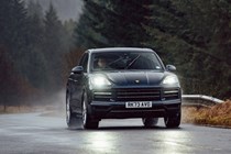 Porsche Cayenne review, Cayenne S V8, front, driving in the rain with headlights on, blue