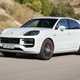 Porsche Cayenne review - 2023 facelift - Turbo E-Hybrid, white, front, driving on circuit
