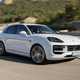 Porsche Cayenne review - 2023 facelift - Turbo E-Hybrid, white, front, driving round corner on circuit