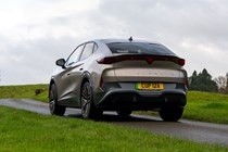 Cupra Tavascan (2024) review: rear three quarter static, silver paint