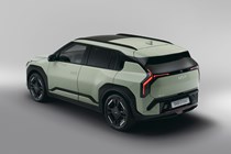 Kia EV3 (2024) reveal: rear three quarter static, green paint, studio shoot