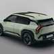Kia EV3 (2024) reveal: rear three quarter static, green paint, studio shoot