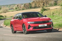 Best electric estate cars 2024 - Vauxhall Astra Sports Tourer Electric, red, front, driving
