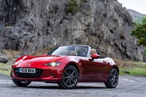 Mazda MX-5 ND review - front view, red, roof down
