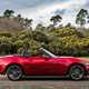 Mazda MX-5 ND review - side view, red, roof down, countryside