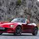 Mazda MX-5 ND review - front view, red, roof down