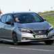 Nissan Leaf review, silver, front view, driving round corner
