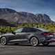 Audi A5 Sportback (2024): rear three quarter static, grey paint