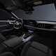 Audi A5 Sportback (2024): dashboard, front seats and infotainment system, black fabric upholstery