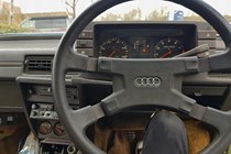 The mouldy steering wheel of an Audi, in need of some cleaning.