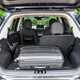 Hyundai Inster review, black, boot capacity, split seats down, suitcase | Parkers