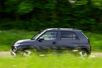 Hyundai Inster review, black, exterior, moving, side profile | Parkers