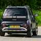 Hyundai Inster review, black, exterior, moving, rear three quarters | Parkers