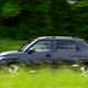 Hyundai Inster review, black, exterior, moving, side profile | Parkers