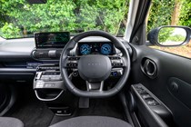 Hyundai Inster review, black, interior, steering wheel | Parkers