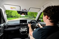 Hyundai Inster review, black interior, Ryan Gilmore driving | Parkers