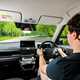 Hyundai Inster review, black interior, Ryan Gilmore driving | Parkers