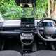 Hyundai Inster review, black, interior, dashboard, steering wheel | Parkers