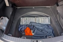 Image of the Toyota Corolla Commercial's spare wheel well storage area