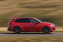 Audi Q7 (2025) review: side view driving, red paint