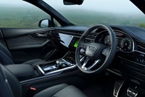 Audi Q7 (2025) review: front seats and dashboard, black leather upholstery