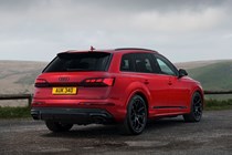 Audi Q7 (2025) review: rear three quarter static, red paint