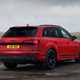 Audi Q7 (2025) review: rear three quarter static, red paint