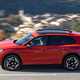 Volkswagen Tiguan eHybrid review - side, orange, driving