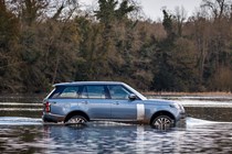 Blue 2019 Range Rover side elevation driving through water