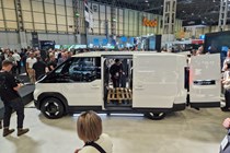 Kia PV5 electric van at the CV Show 2025, side, white.