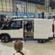 Kia PV5 electric van at the CV Show 2025, side, white.