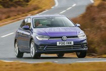 Volkswagen Polo (2024) review: front three quarter cornering, British road, purple paint