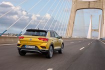 Volkswagen T-Roc driving, yellow, rear