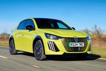 Peugeot e-208, green, driving, front three quarters