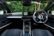 Alpine A290 review, interior, black, dashboard and steering wheel | Parkers