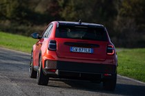 Abarth 600e (2024) review: rear cornering, orange paint