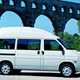 Image of Volkswagen T4 high roof camper van in white, side view