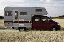 Image of a Volkswagen T5.1 Transporter motorhome, viewed from the right-hand side