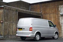 Image of the Volkswagen T5 Transporter panel van, in silver, viewed from the right rear corner