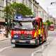 Image of a Mercedes Atego fire engine with lights flashing