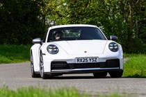 Porsche 911 992.2 Carrera T in white, dynamic front