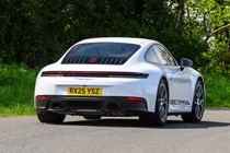 Porsche 911 992.2 Carrera T in white, dynamic rear