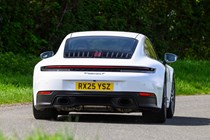 Porsche 911 992.2 Carrera T in white, dynamic rear