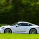 Porsche 911 992.2 Carrera T in white, dynamic side shot
