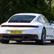 Porsche 911 992.2 Carrera T in white, dynamic rear