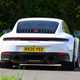 Porsche 911 992.2 Carrera T in white, dynamic rear