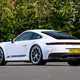 Porsche 911 992.2 Carrera T in white, static rear three-quarter