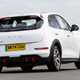 GWM Ora 03 review, white, dynamic, cornering, rear three quarters | Parkers